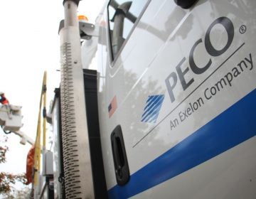PECO truck in the foreground, PECO worker in the background