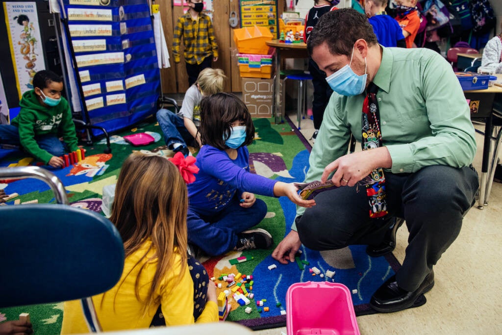 Rob Palazzo interacting with students in the classroom