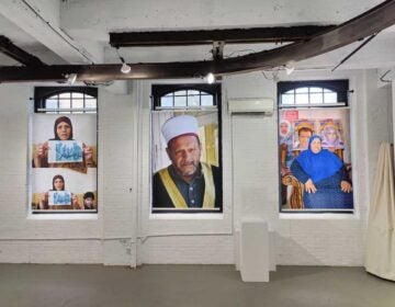 Photos of Palestinians displayed on a wall