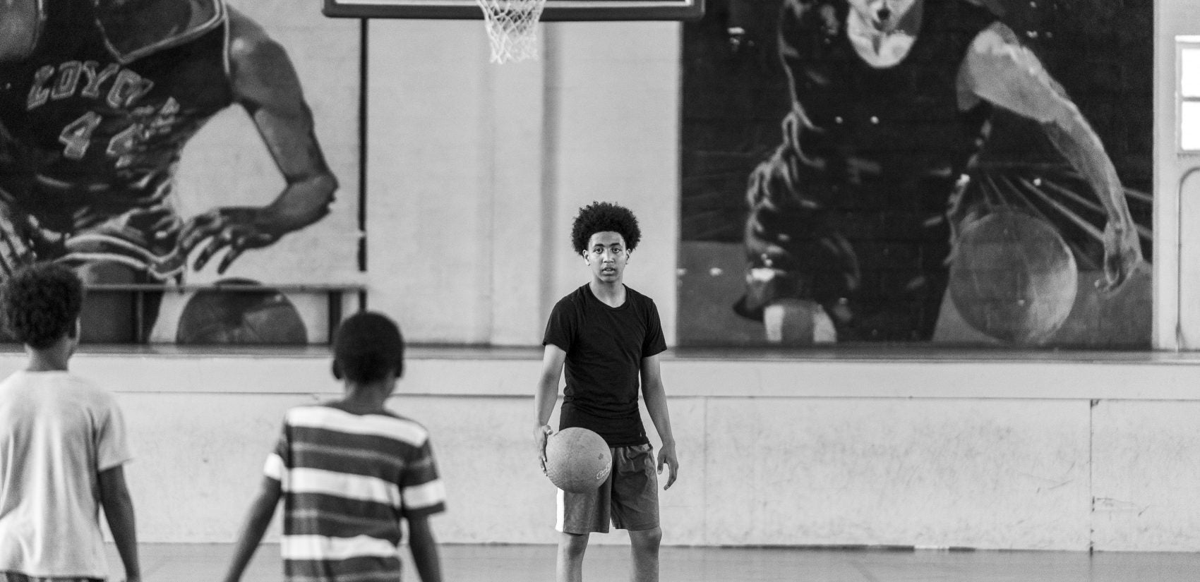 Shawn, 15, inside the Hank Gathers Rec Center gym. (Jessica Kourkounis for Keystone Crossroads)