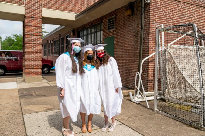 Ashley with friends on graduation day at Little Flower Catholic School for Girls in Hunting Park. (Jessica Kourkounis for Keystone Crossroads)