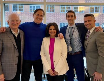 Mark Cuban poses with University of Pennsylvania Health System CEO Kevin Mahoney (left) and Penn Medicine vice president and chief pharmacy officer Nishaminy Kasbeker (center).