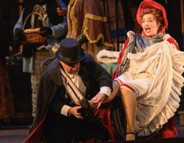 A scene from the opera, with actors on stage