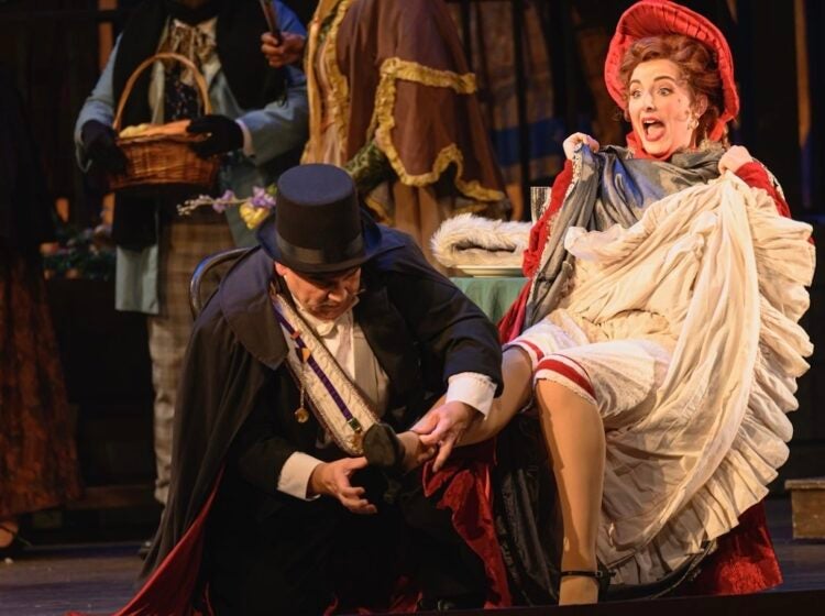 A scene from the opera, with actors on stage