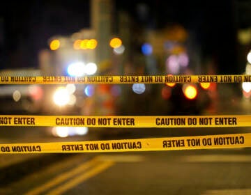 Crime tape is seen in the area of a shooting in Philly
