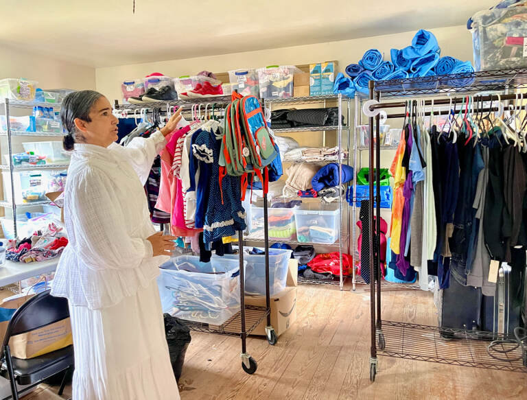 Dana Ellis, a volunteer, at the Shepherd's Office. (Johnny Perez-Gonzalez/WHYY)