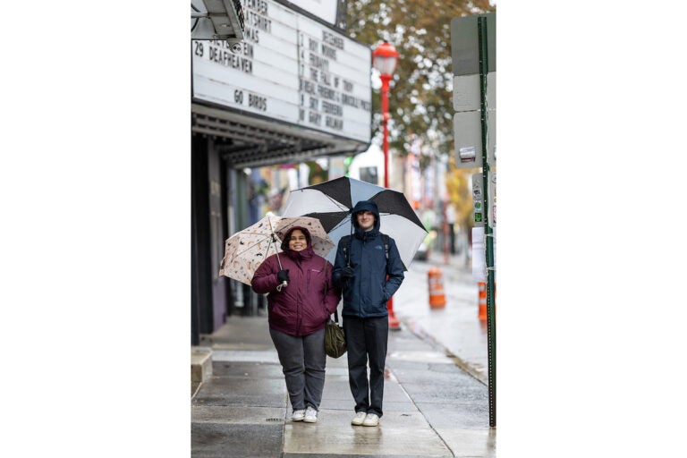 Two people pose for a photo