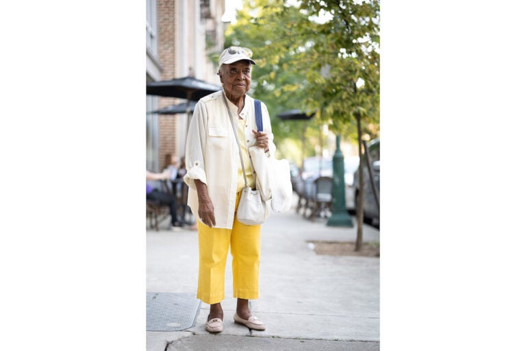 A woman poses for a photo