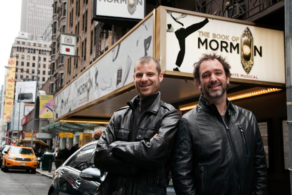 Trey Parker and Matt Stone pose outside