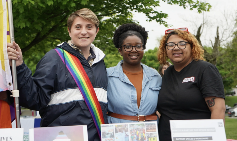 Three people from the UDTJ nonprofit